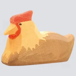 Ostheimer Holzfigur Huhn braun liegend